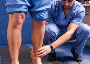 Young man on study of the tread in a podiatry cabinet